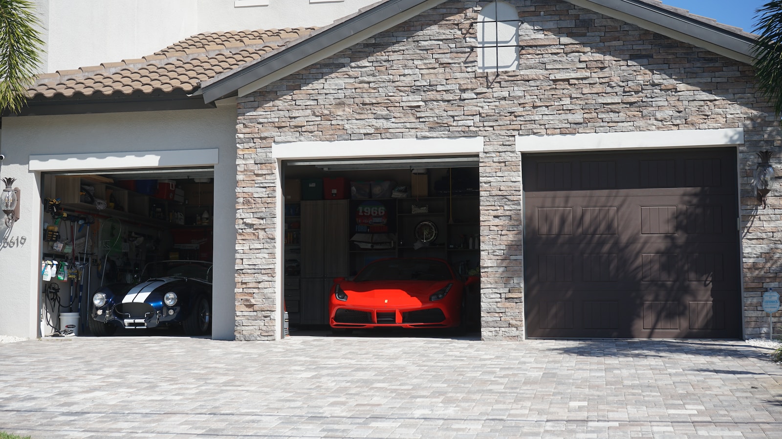 a car is parked in the garage of a house